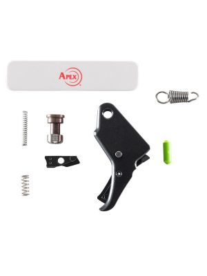 Black anodized aluminum trigger, three springs, two small steel parts, a green slave pin, and Apex sight tool