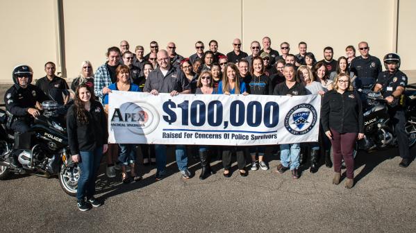 Apex Celebrates $100,000 Raised For C.O.P.S.